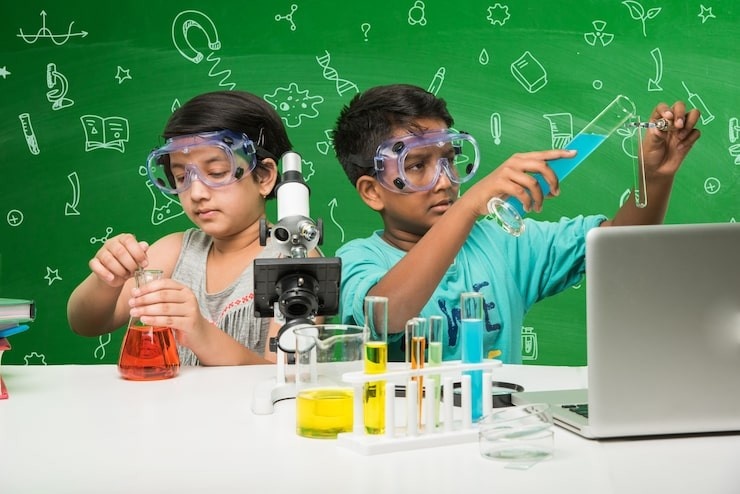 Kids enjoying STEM summer camp activities